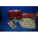 A leather Satchel bag by Hakuba, military canvas bag, an Argentine leather stationery wallet,