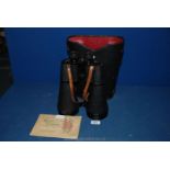 A pair of large Wilkinson Binoculars 30 x 80 in black leather case and a book of cigarette cards