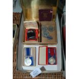 A Brass Cigarette Box containing Festival of Britain Medal,