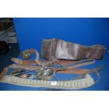 Three leather cartridge Belts and a leather gun case, two ear defenders, etc,