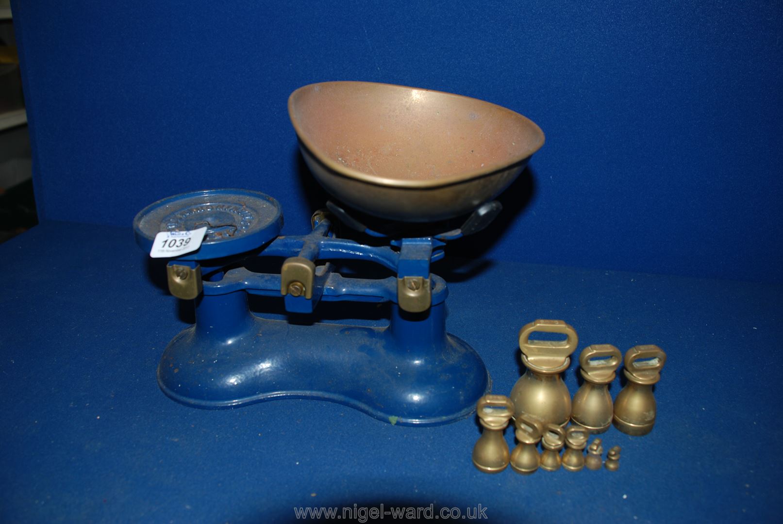 A pair of Kitchen balance Scales and weights