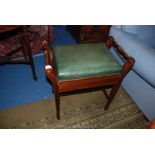 An Edwardian style inlaid Piano Stool with nailed green leather seat