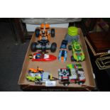 A retired assembled Lego Racing themed Models including a Technic Quad Bike, a Speedboat,