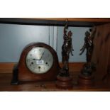 A pair of Spelter figures and a Smiths mantle Clock with key