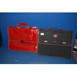 A red leather Italian Case and a Liberty Case