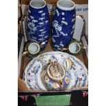 An old repaired early Chinese Plate and a similar plate, blue Oriental style Urn,