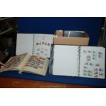 Two brown Stamp Albums containing QV - QEII,