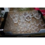 A quantity of cut crystal glass including hock, liquor, tumblers, wine,