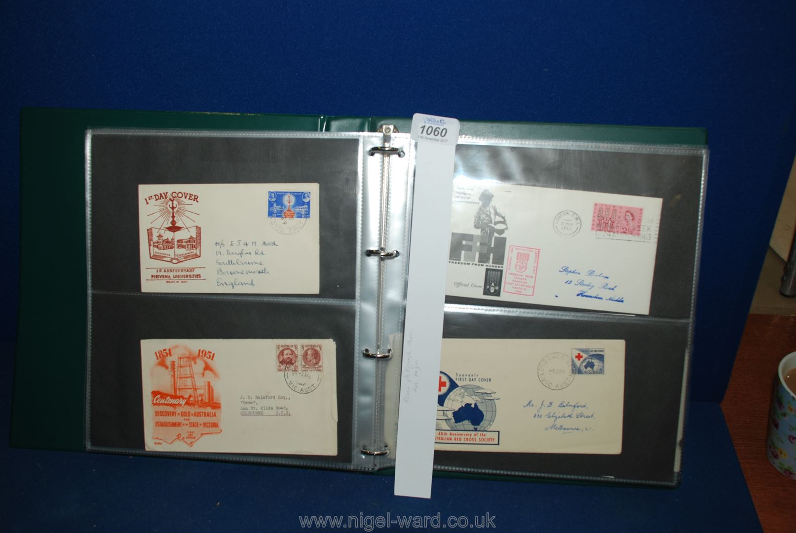 A green Postal Cover/FDC Album, 34 double pages x 4 (136 covers).