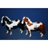 A Beswick Piebald and Beswick Skewbold Pony,