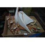 A wooden model of a Galleon, 15" long, a Yacht 20" long also a ship in a bottle and one other.
