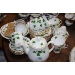 A Colclough ivy decorated Teaset, comprising twelve cups and saucers, side plates and Teapot,