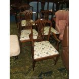 A set of four mahogany Dining Chairs (including two carvers),