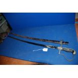 A WWI German Military Dress Sword, 40 1/2'' long, in metal sheath,
