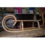 A late 19th century ash Child's Toboggan, bent ash frame,