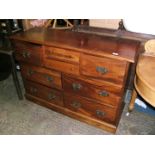 A modern hardwood Sideboard with moulded top,