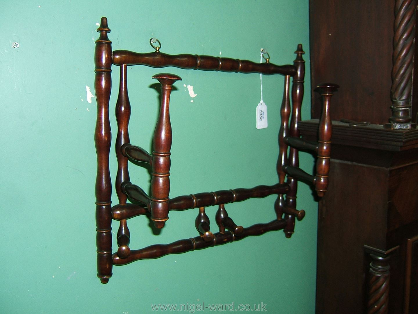 An antique fruitwood Hat Rack