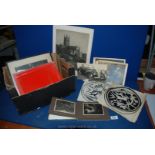A box of old photographs,