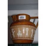 A Doulton Lambeth Jug with Egyptian figures and sphinx style spout