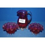 Three pieces of Victorian Cranberry Glass