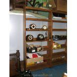 A large modern Pine open Bookcase with three narrow shelves over four lower wide shelves.