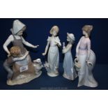 Four Lladro Figures including girl with a puppy, girl and boy with a goose,