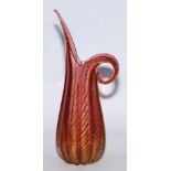 A Barovier and Toso Venetian glass red Pitcher Vase with gold foil inclusions,