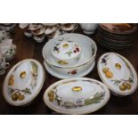A quantity of Royal Worcester 'Evesham' Tableware including pie plate, oval lidded serving dishes,