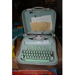 A cased Hermis 3000 Typewriter