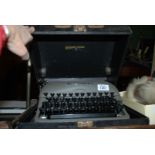 A Remington Rand Typewriter in case