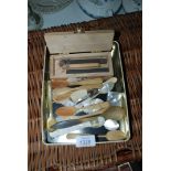 A quantity of mother of pearl Spoons, bone Spoons, etc.