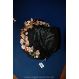 A Victorian black lace and satin Hat with hand-made material flowers