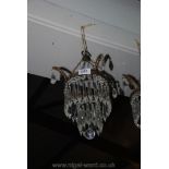 A small glass Chandelier