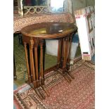 A Nest of three oval topped Mahogany Tables,