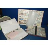 Two stock books, one of French Stamps, the other of Australian stamps,