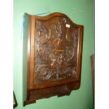 An antique dark-wood wall-hanging Cupboard of Italian influence,