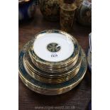 A quantity of Royal Doulton 'Carlyle' pattern china including nine dinner plates,