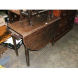 A Georgian Mahogany drop leaf Table, rectangular top with 'D' shaped drop leaves,