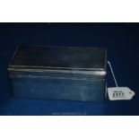 A Silver Table Cigarette Box with engine turned decoration to the lid,