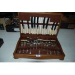 A silver plated Canteen of Cutlery with bone handles to knives in a mahogany box circa 1938