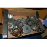 A quantity of Pewter, etc. including Teasets, tankards, dishes, etc.