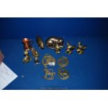 A quantity of brass items including four horse brasses, two mice, cats, pig, duck,