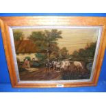 An Oil on canvas of Cows in a maple frame