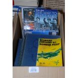 A box of War books, videos and DVDs incl Bomber Pilot,