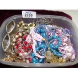 A box of mixed Costume Jewellery including twelve necklaces, brooches, bracelets,