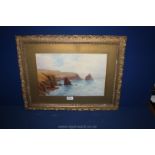 A framed and mounted Watercolour of a Coastal scene in North Cornwall signed lower left L.H.