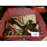 A red handled Box containing various jewellery, watches, etc.