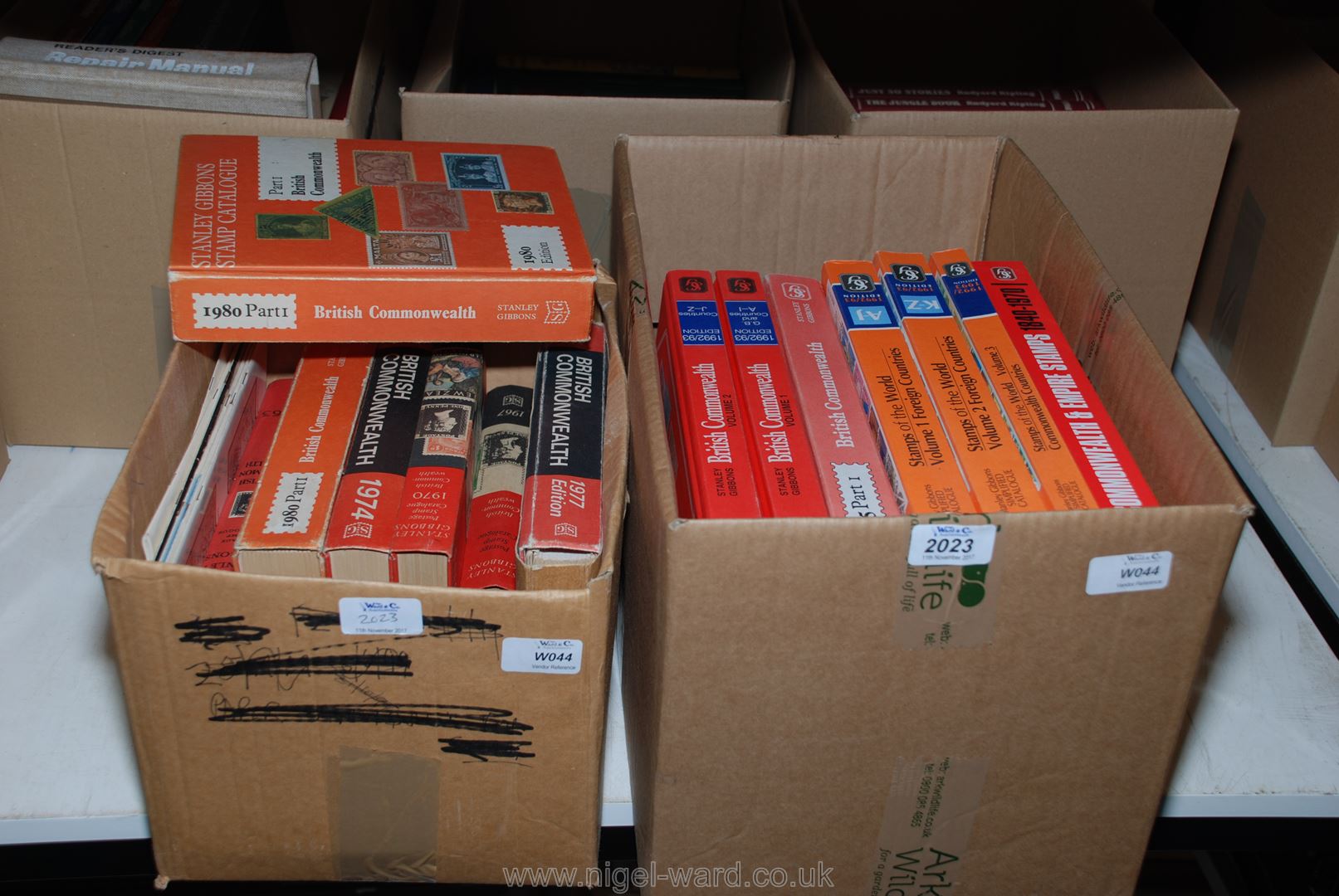 Two boxes of books relating Stamp Collecting and Stamps,