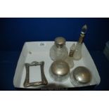 A silver topped scent Bottle and two matching dressing table Pots,