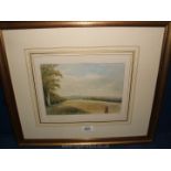 A framed and mounted Watercolour of two young girls taking in a country landscape,